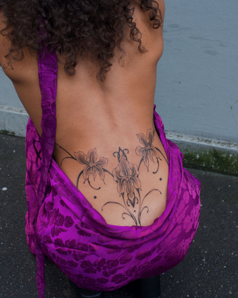 floral tattoo lower back